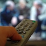 Remote control pointed at TV
