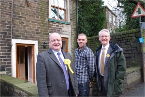 Andrew Stunell and Elwyn Watkins visiting a home brought back into use after being left empty for 10 years