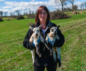 Jane Dodds and two lambs