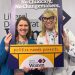 Jo Swinson and Donna Harris pose in "No Childcare, no changemakers, photo frame.